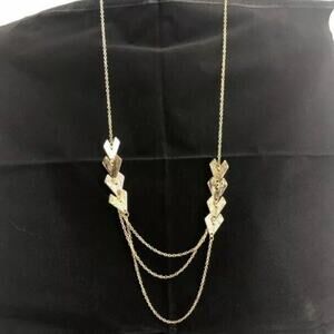 NWT Material Girl brand gold arrow necklace. Multi Layer Chain Embellishment